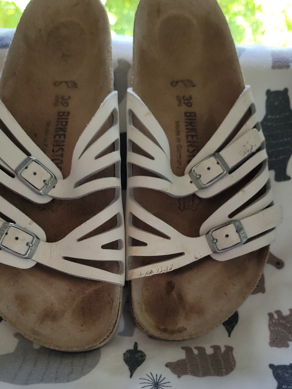 Birkenstock White Strappy Women’s Slide Sandals with Silver Buckles